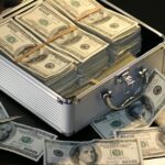 Grey Metal Case of Hundred Dollar Bills